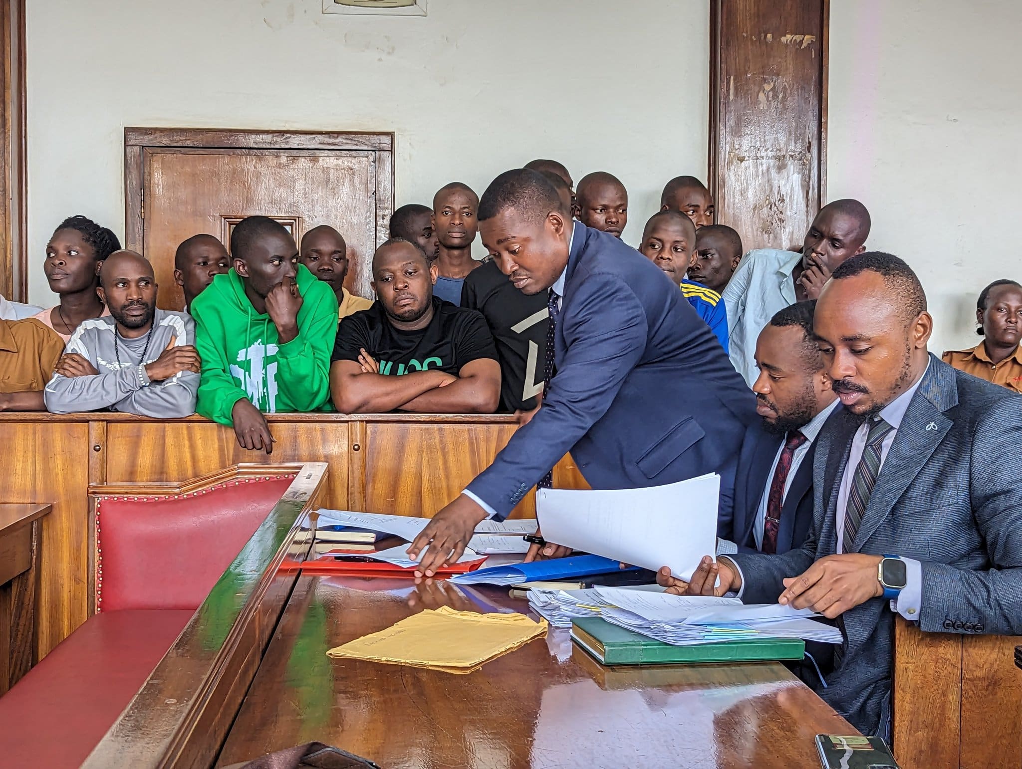 GW0IYRmWsAAgq1v Ugandan human rights defender Aryampa Brighton during a court case, in the trial against local youth activists criminalized for standing up against EACOP.